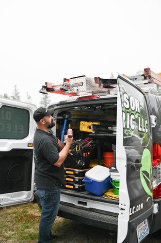 Dickson Electric crew is holding a powertool